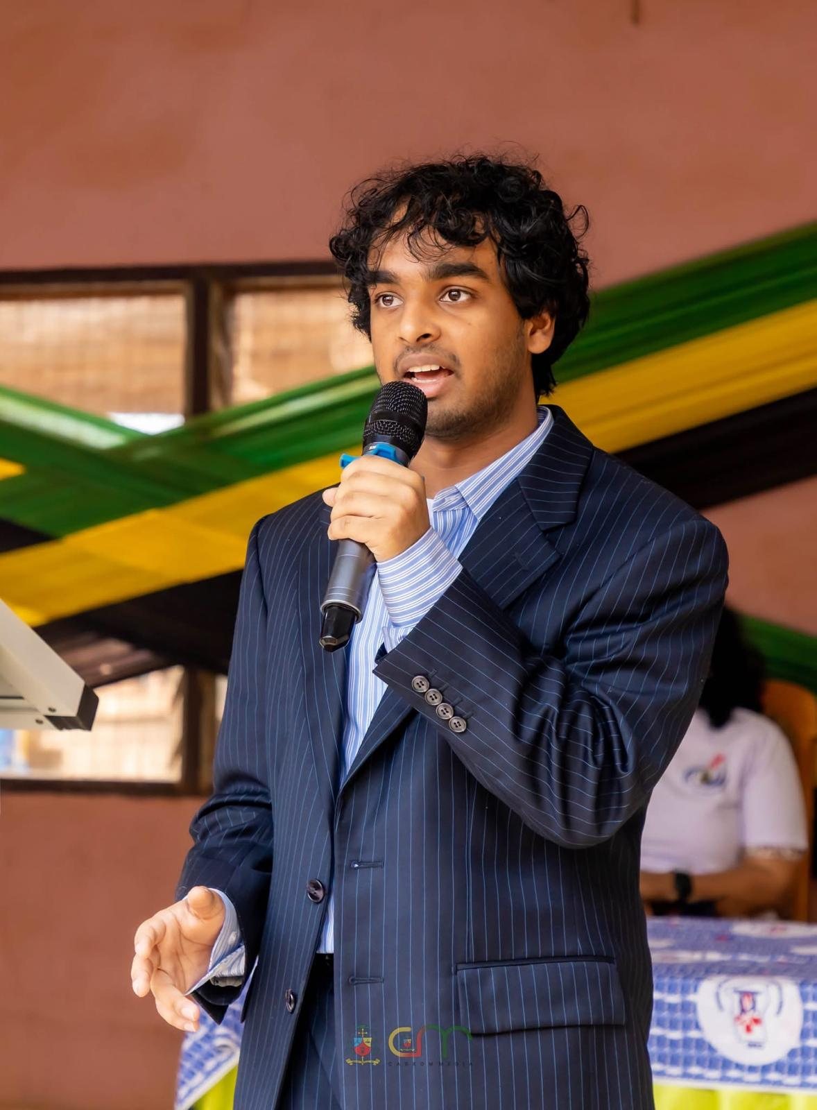 Nathan Francis addressing the community on the microphone
